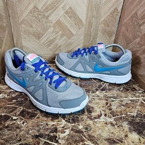 Nike women's Revolution 2 running shoes size 9.5.    087